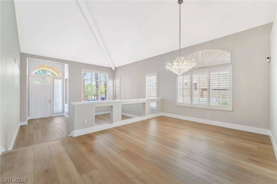 1278 Autumn Wind Way, Henderson, NV 89052 A grand entrance welcomes guests, leading to an open-concept living space with polished hardwood flooring.