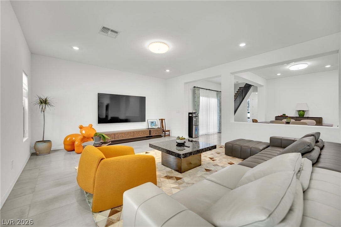 7710 Weekes Court, Las Vegas, NV 89113 Clean lines and tiled floors define this open, airy living space.