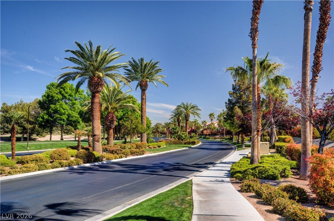 115 Cora Hills Court, Las Vegas, NV 89148 Palm-lined streets wind through this inviting neighborhood, promising tranquil living.
