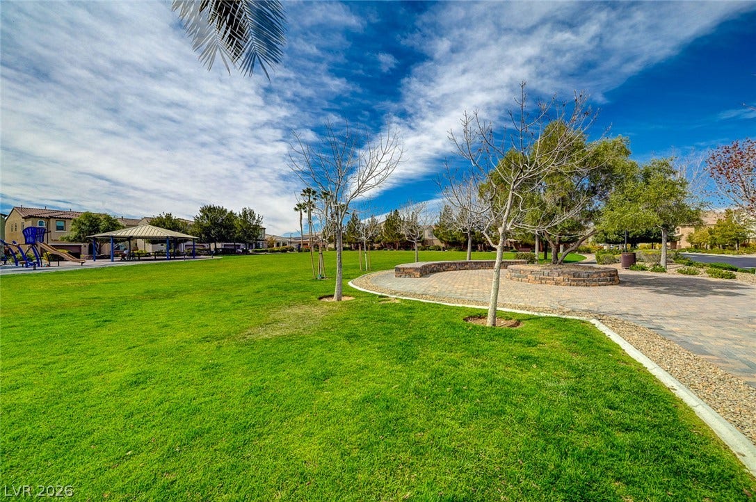 115 Cora Hills Court, Las Vegas, NV 89148 Green space provides a perfect backdrop for outdoor gatherings.