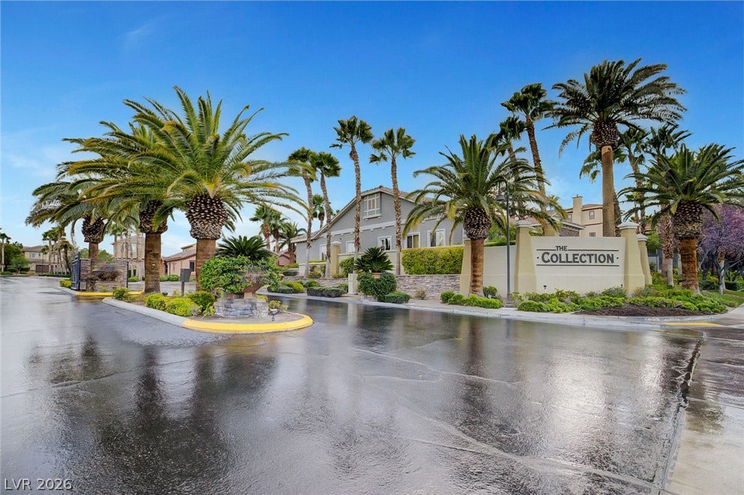 115 Cora Hills Court, Las Vegas, NV 89148 Lush palms frame the grand entrance to "The Collection," inviting residents into an exclusive community.
