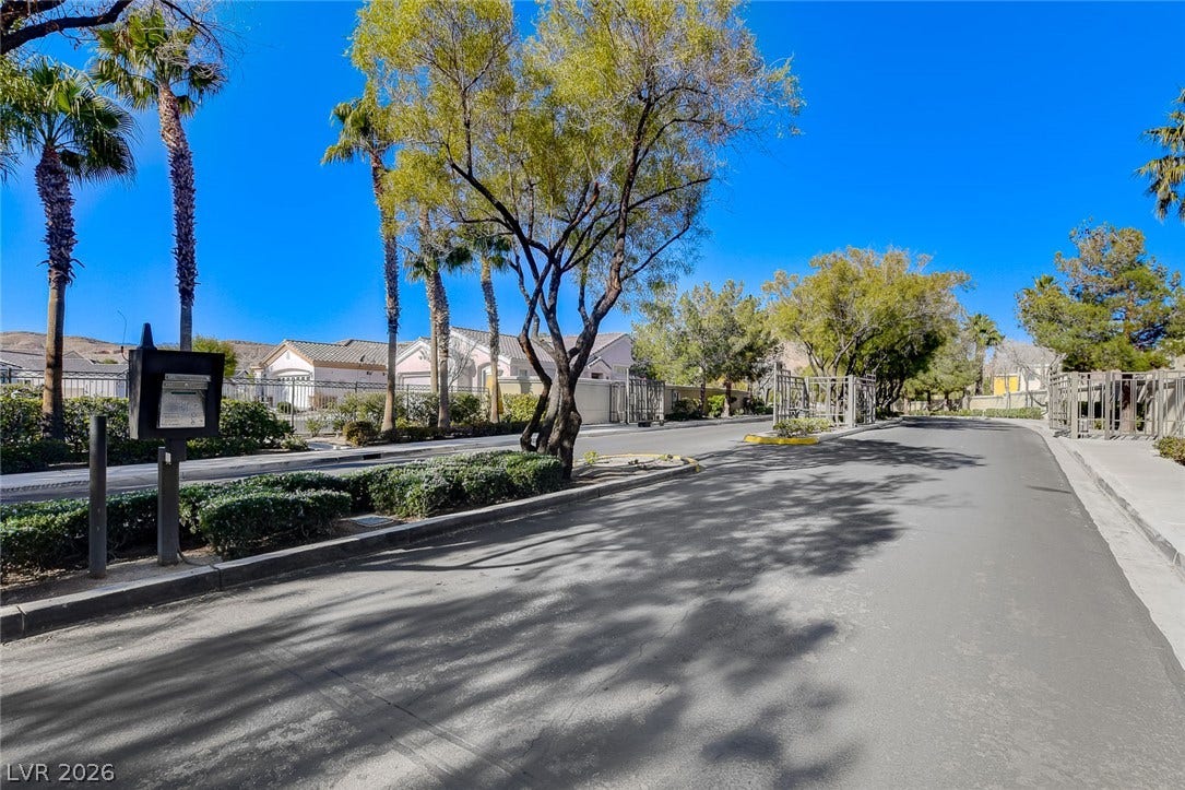 115 Cora Hills Court, Las Vegas, NV 89148 Enter a community offering security and privacy with its welcoming gated entrance.