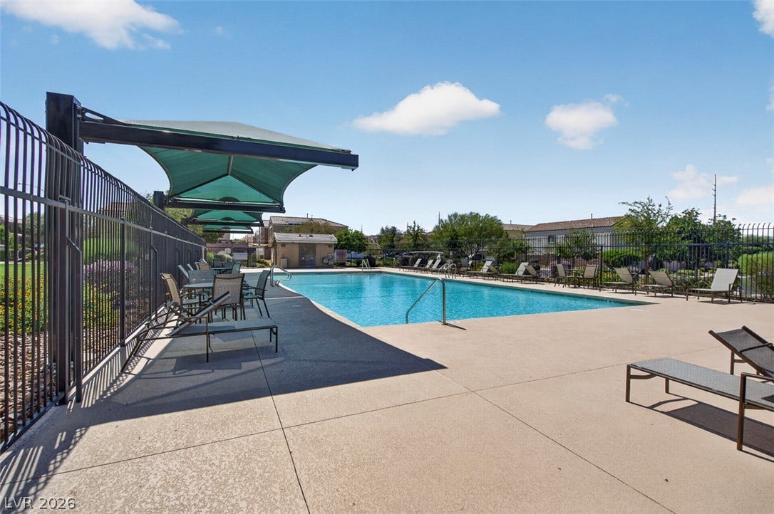 1146 Jesse Harbor Avenue, Henderson, NV 89014 An inviting community pool with ample seating, perfect for sun-drenched relaxation.