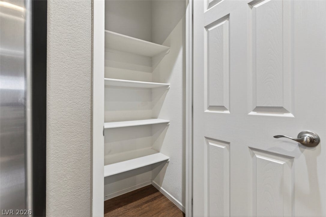 1146 Jesse Harbor Avenue, Henderson, NV 89014 Functional pantry storage with multiple shelves, ensuring organized culinary essentials.