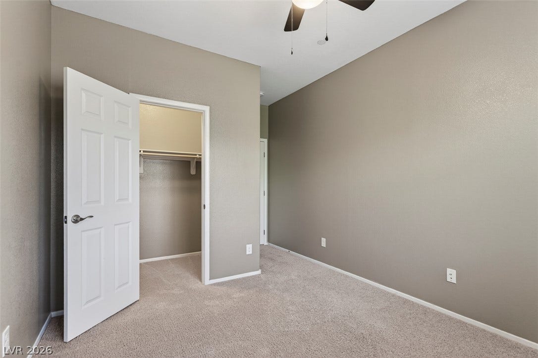 1146 Jesse Harbor Avenue, Henderson, NV 89014 An inviting room boasts carpeted flooring and a convenient walk-in closet.