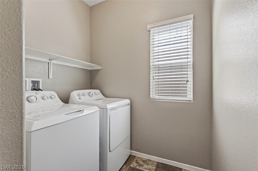 1146 Jesse Harbor Avenue, Henderson, NV 89014 Functional utility room featuring practical shelving and a convenient window.