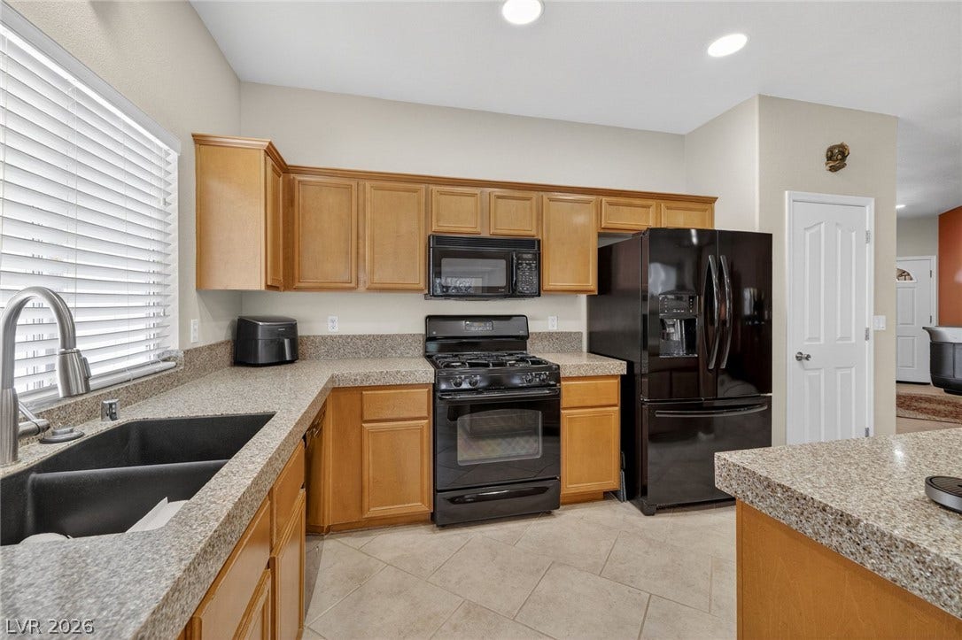 4467 Verdiccio Avenue, Las Vegas, NV 89141 Undermount Graphite Sink and granite counters.