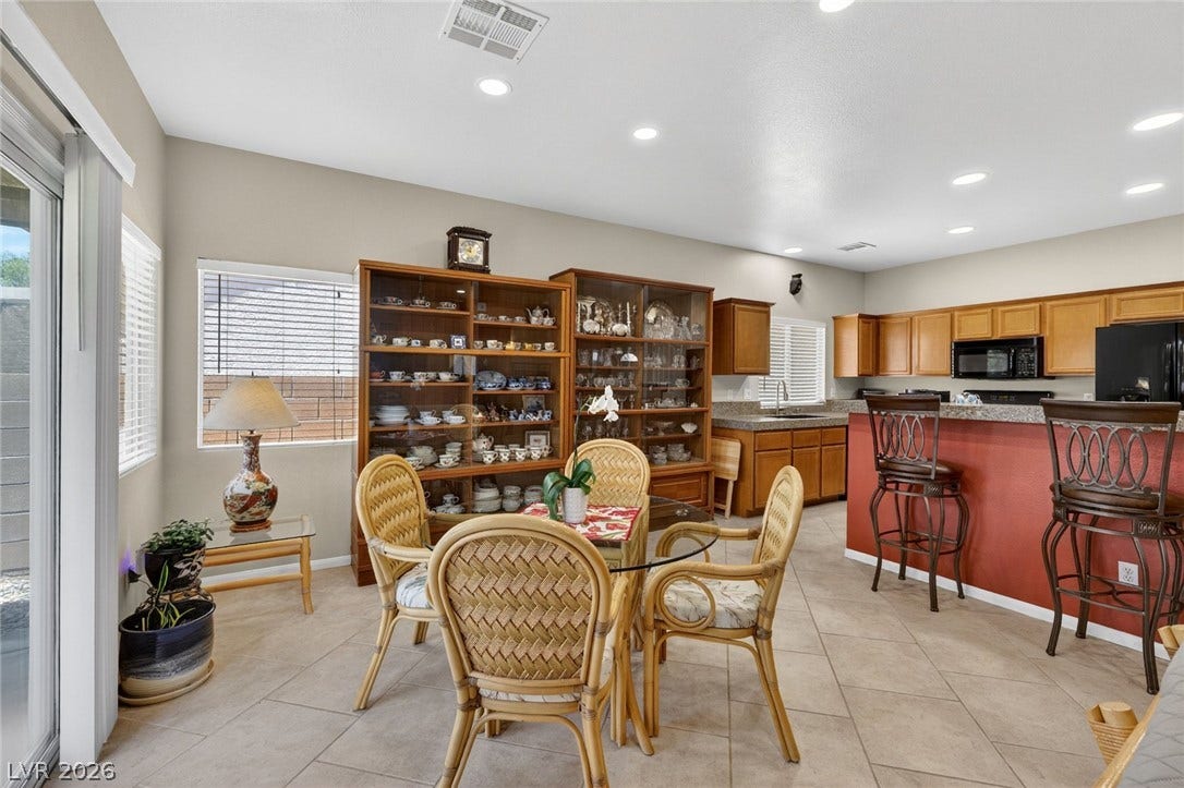 4467 Verdiccio Avenue, Las Vegas, NV 89141 An open concept kitchen and dining area provides flexible space for entertaining and everyday living.