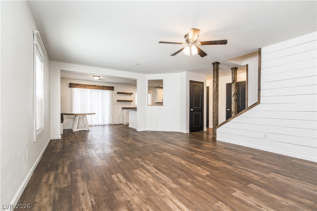 989 Harbor Avenue, Henderson, NV 89002 Natural light pours into this generous living area featuring resilient flooring.