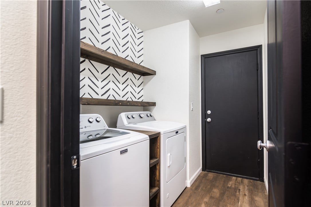 989 Harbor Avenue, Henderson, NV 89002 Functional laundry space featuring convenient shelving and wood like flooring.