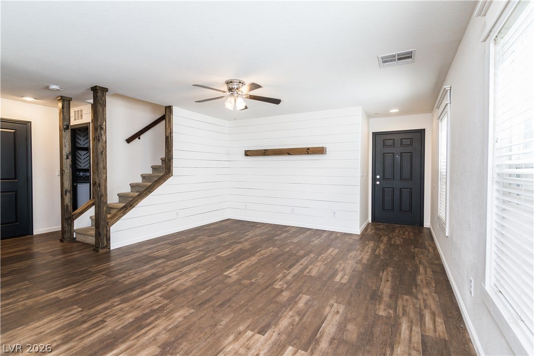 989 Harbor Avenue, Henderson, NV 89002 A well-lit interior space features prominent wooden staircase.