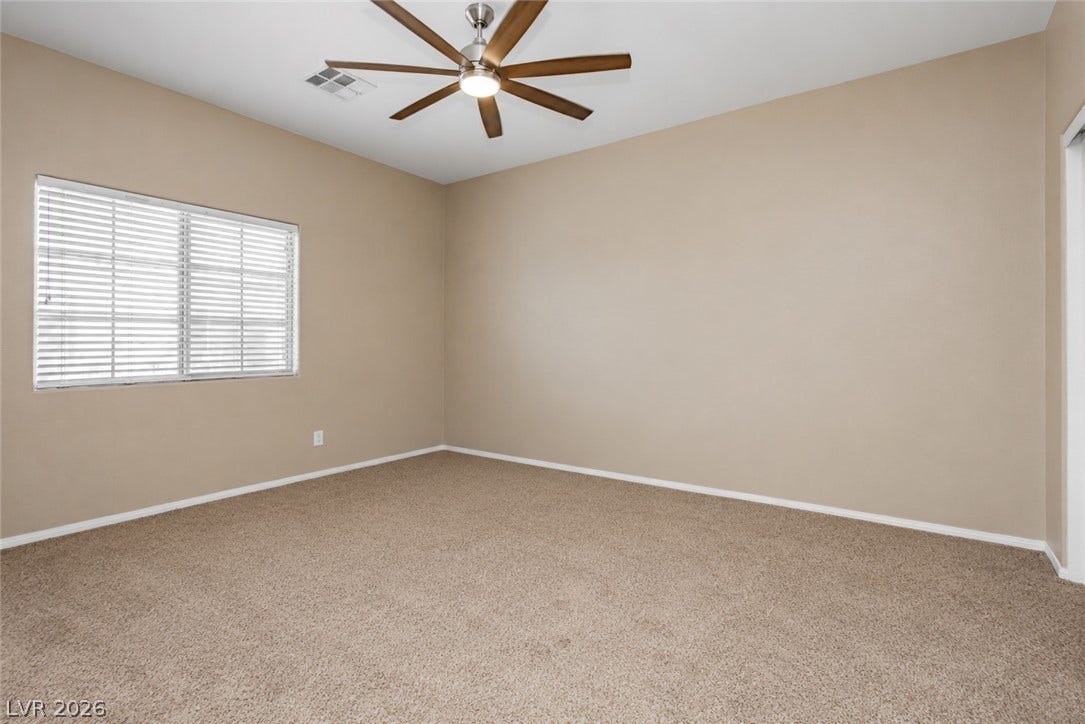 1176 Via Piazza, Henderson, NV 89052 A well-lit bedroom offering a cozy retreat with ample natural light.