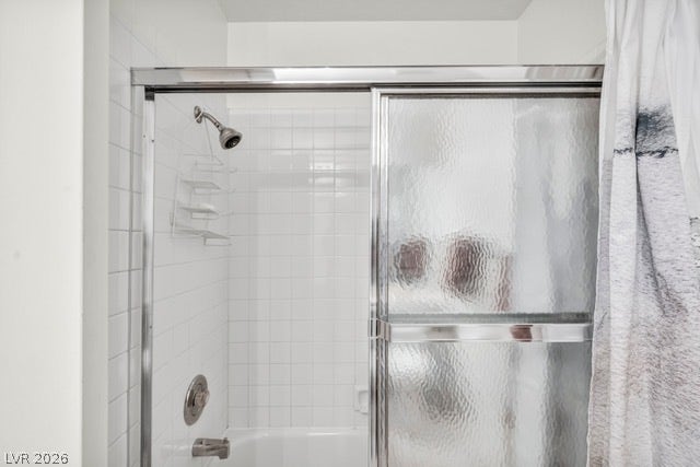 2553 Hummingbird Hill Avenue, Henderson, NV 89074 Well-maintained bathroom features a bright, clean shower with sliding glass doors.