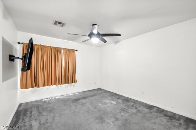 2553 Hummingbird Hill Avenue, Henderson, NV 89074 A quiet bedroom with a ceiling fan overhead, ready for your personal touch.