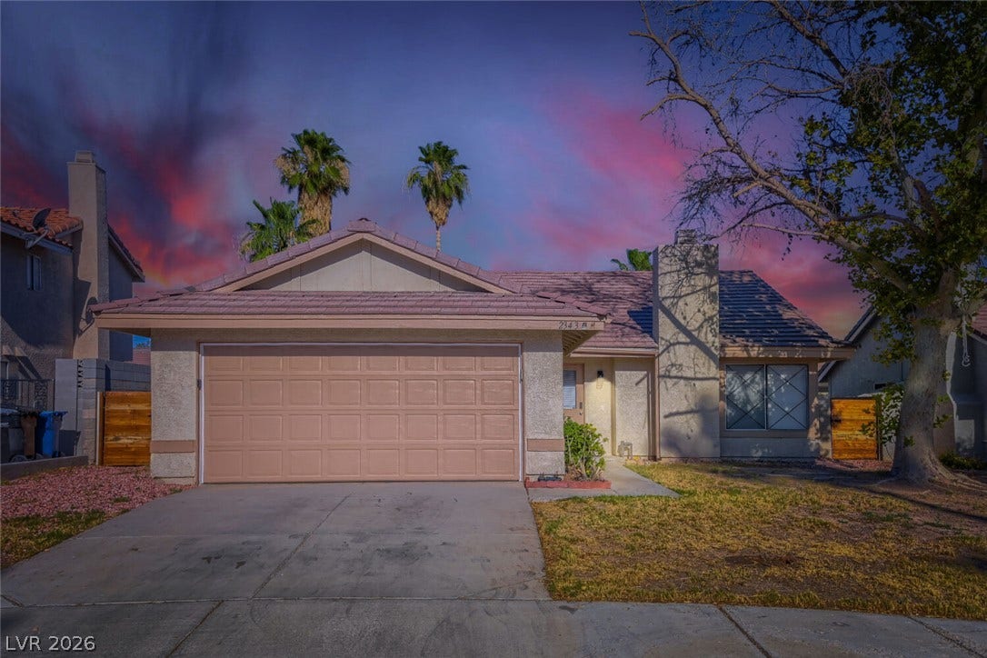 2343 Valleywood Road, Henderson, NV 89014 A welcoming facade with an attached garage and neatly kept front yard.