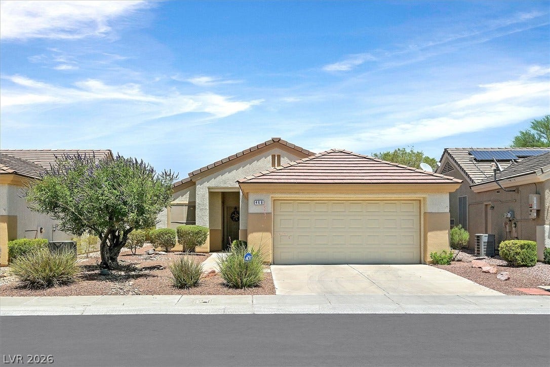 468 Bonnie Brook Place, Henderson, NV 89012 A well-maintained facade with a two-car garage and low-maintenance desert landscaping.