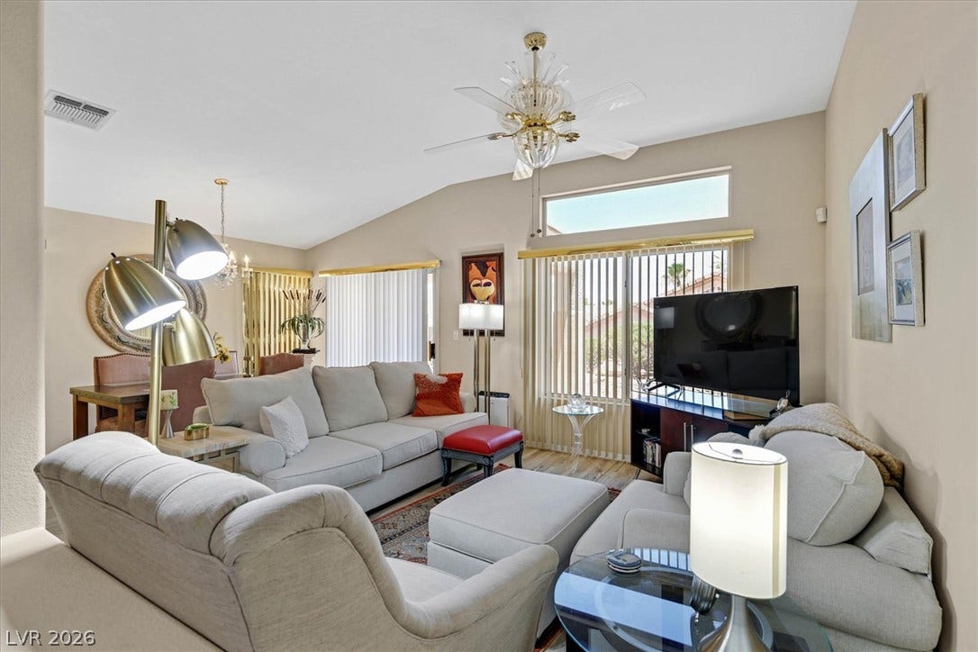 468 Bonnie Brook Place, Henderson, NV 89012 An airy living room with vaulted ceilings invites relaxation and casual gatherings.