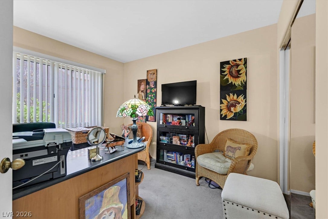 468 Bonnie Brook Place, Henderson, NV 89012 A versatile home office offers ample space for productivity and relaxation. Or can be used as a second bedroom.