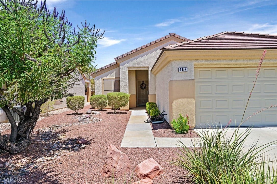 468 Bonnie Brook Place, Henderson, NV 89012 A desert-friendly landscape surrounds this welcoming home.
