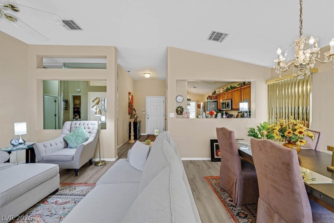 468 Bonnie Brook Place, Henderson, NV 89012 Elegant living and dining areas combine with an open kitchen for effortless entertaining.