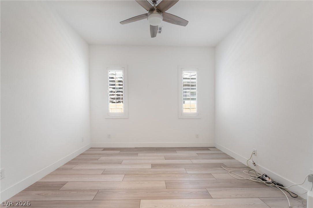 330 Meadow Brush Place, Henderson, NV 89011 Hardwood-style flooring and natural illumination define this versatile space.