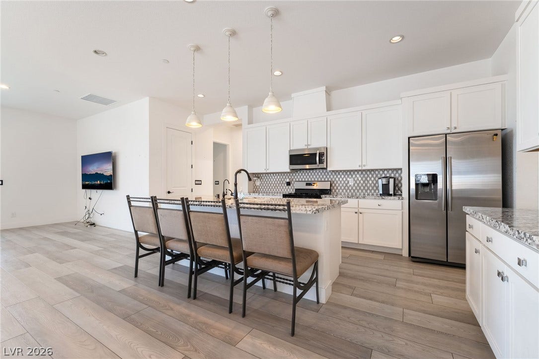 330 Meadow Brush Place, Henderson, NV 89011 Bright, modern kitchen with an inviting island and ample space for culinary creations.