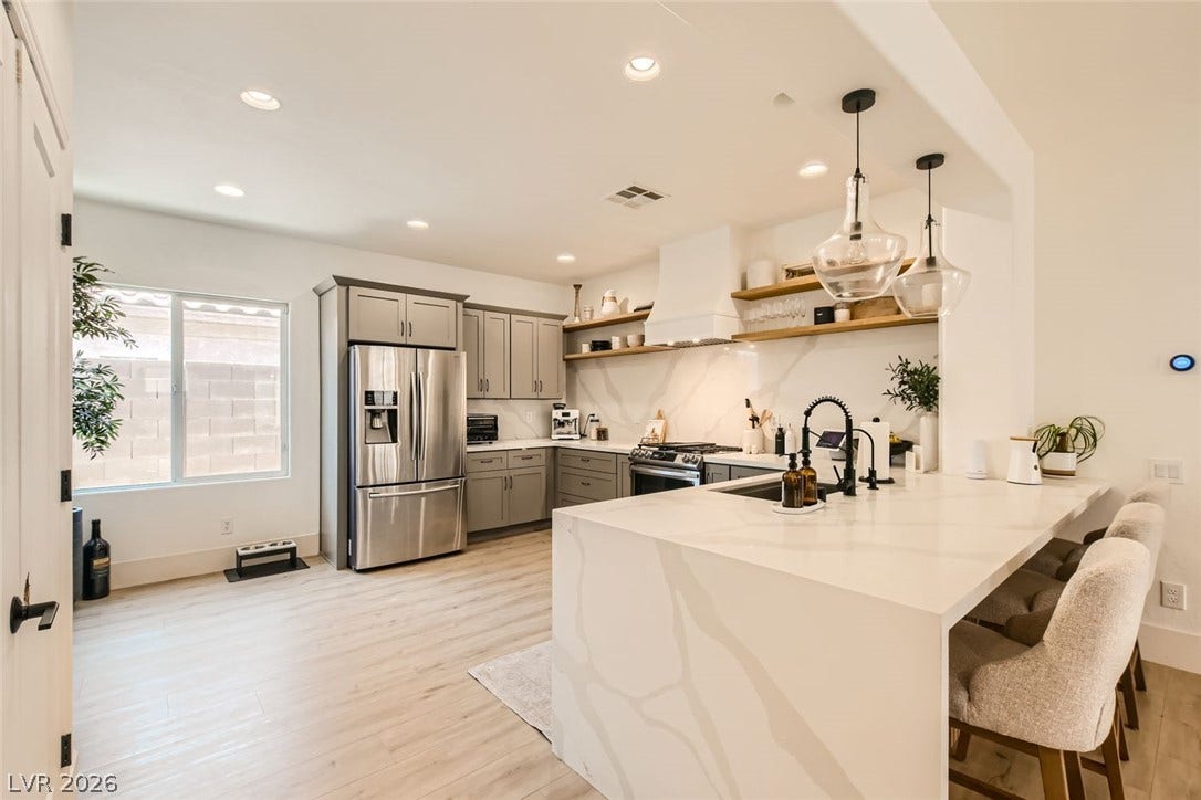 2724 Mintlaw Avenue, Henderson, NV 89044 Culinary aspirations come alive in this well-appointed kitchen, where functionality meets stylish design.