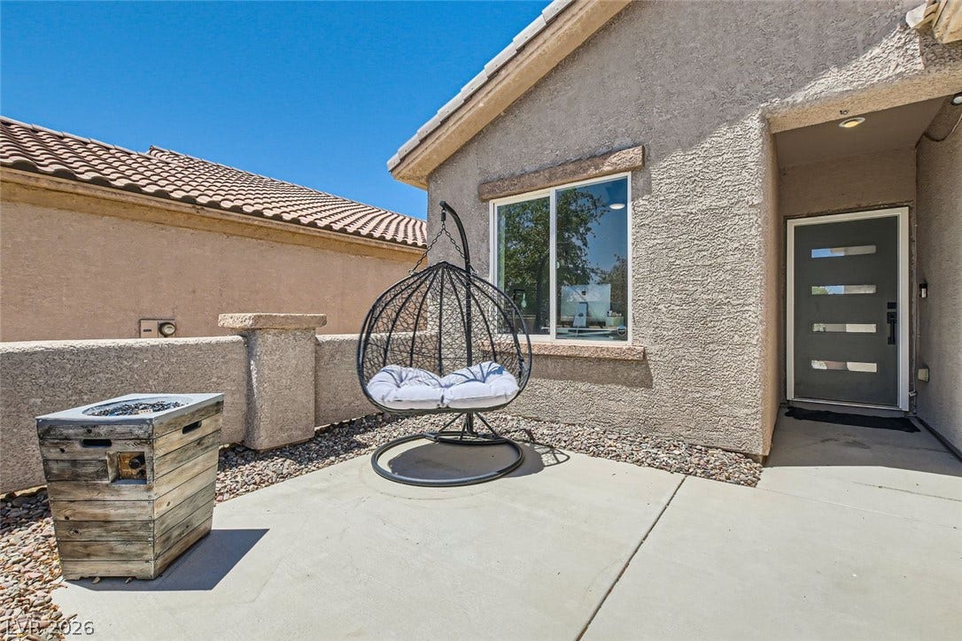 2724 Mintlaw Avenue, Henderson, NV 89044 A welcoming entry, complete with a modern door, inviting you into a residence of comfort.