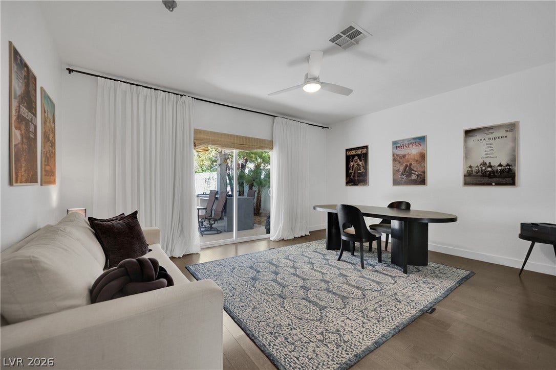 2516 Serenity Hollow Drive, Henderson, NV 89052 Hardwood floors and a ceiling fan enhance this Flexible-Use bedroom, office or gym (Murphy Bed) (Mirrored Closet Doors)