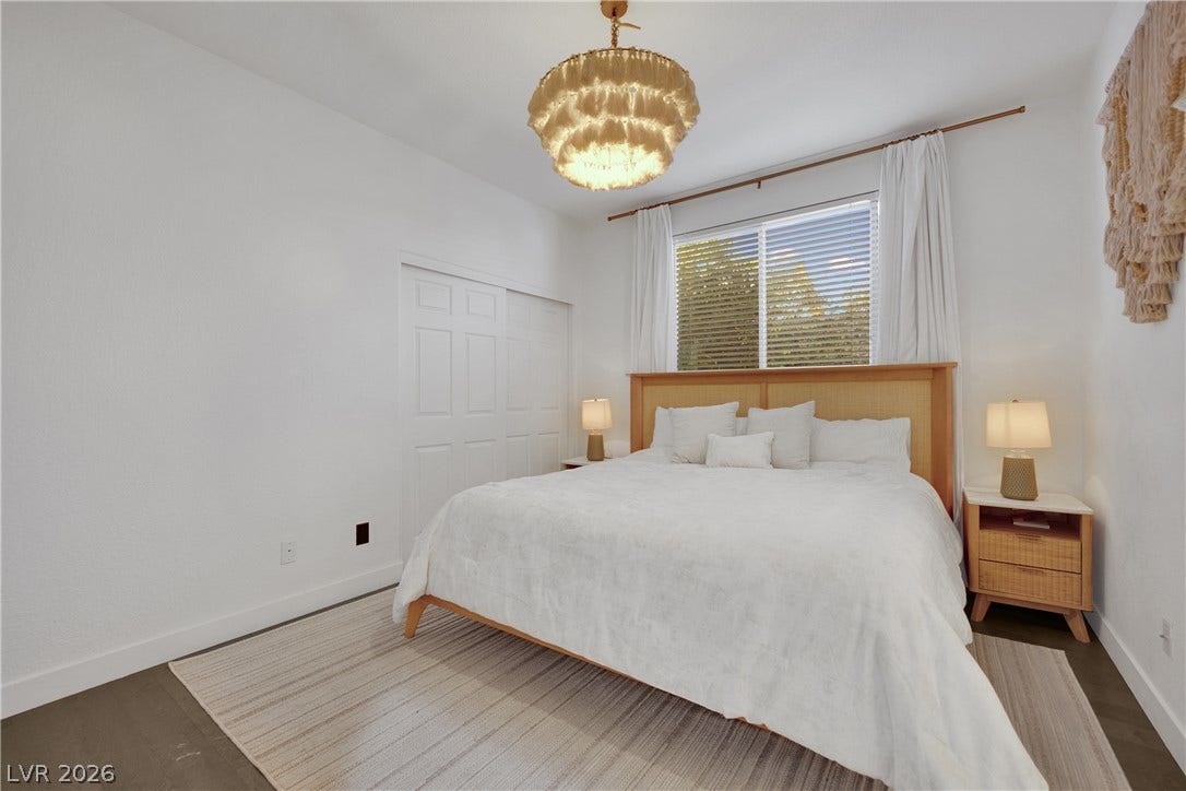 2516 Serenity Hollow Drive, Henderson, NV 89052 A Generous sized bedroom with ample light and closet space.