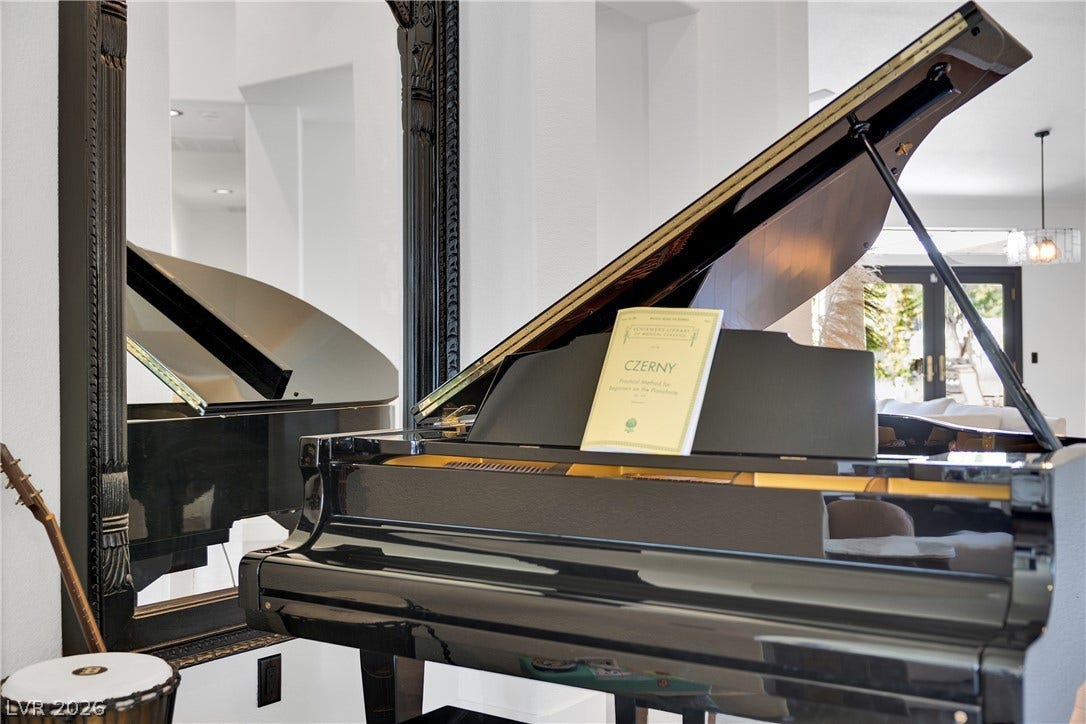 2516 Serenity Hollow Drive, Henderson, NV 89052 A Beautiful Piano creates an Elegant Focal Point .