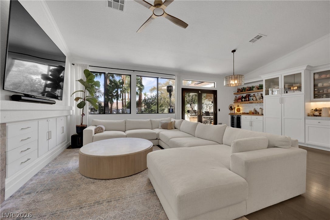 2516 Serenity Hollow Drive, Henderson, NV 89052 Spacious Great Room/Living Area with Custom Built In's, Ceiling Fan & Vaulted Ceiling.