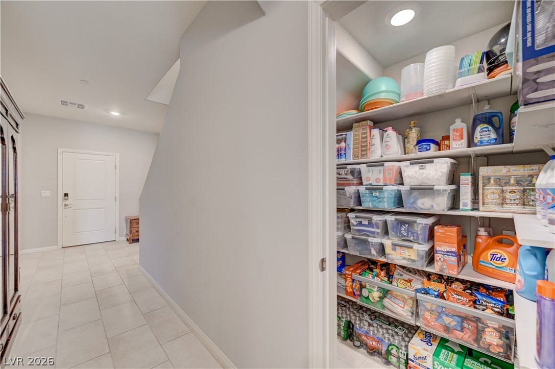 A well-organized pantry featuring ample shelving for all your storage needs.