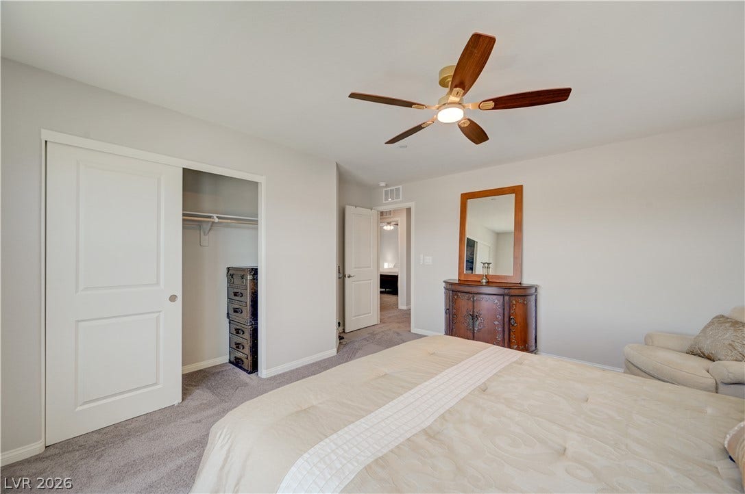 Relax in this well-appointed 2nd bedroom featuring soft carpeting and a convenient sliding closet door.