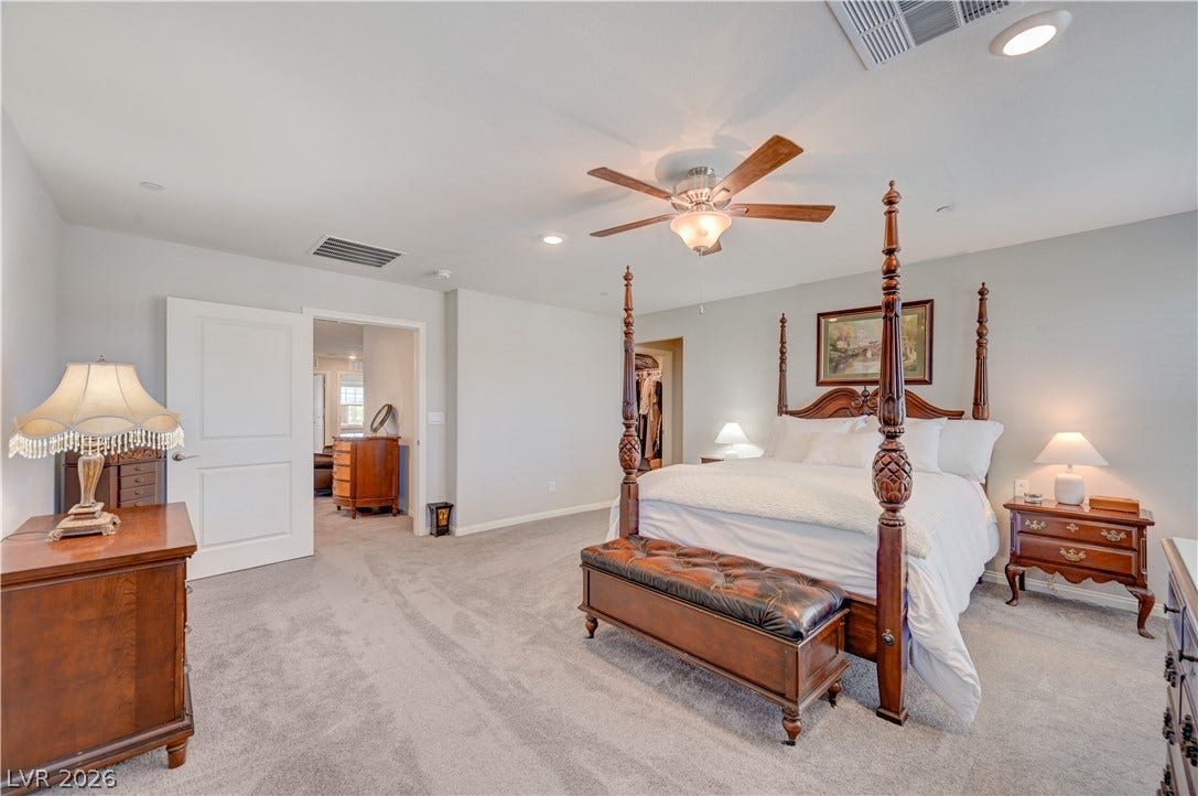 Relax in this tranquil bedroom with retreat, ceiling fan & light