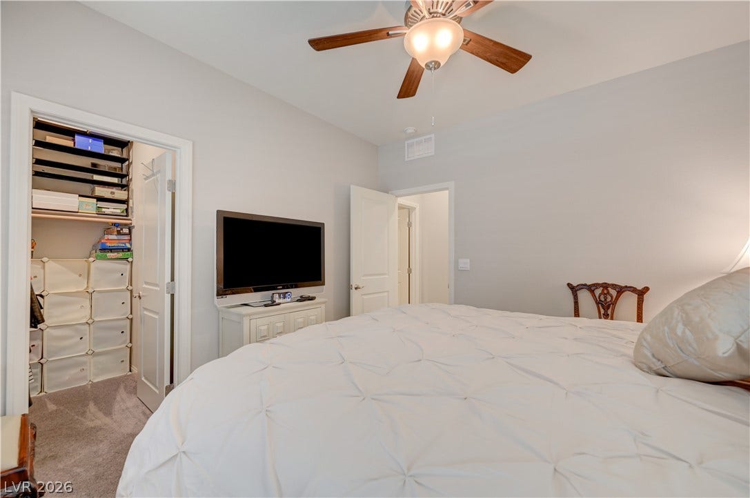 5th guest bedroom conveniently located downstairs with its own bath & walk in close for multi generational living..