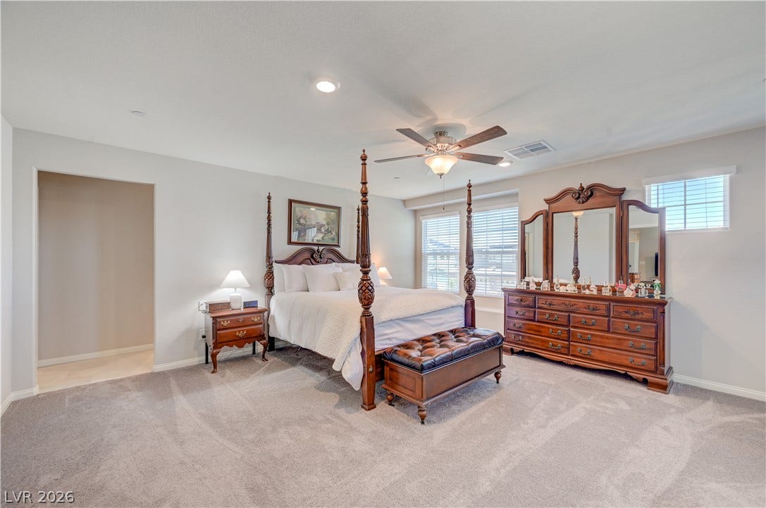 Relax in this tranquil bedroom with retreat, ceiling fan & light