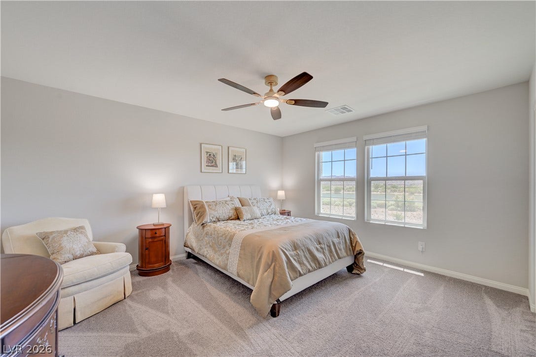 2nd bed is Well-lit sleeping quarters feature soft carpeting and a ceiling fan for year-round comfort.