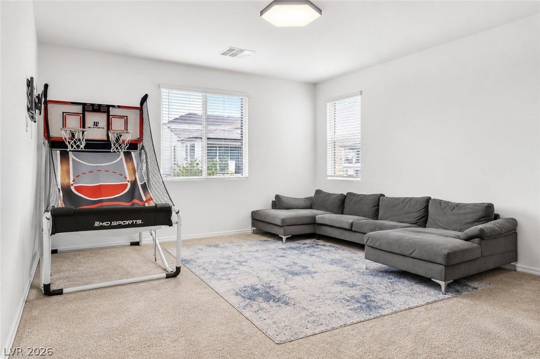 A well-lit recreational area provides ample space for leisure and entertainment.
