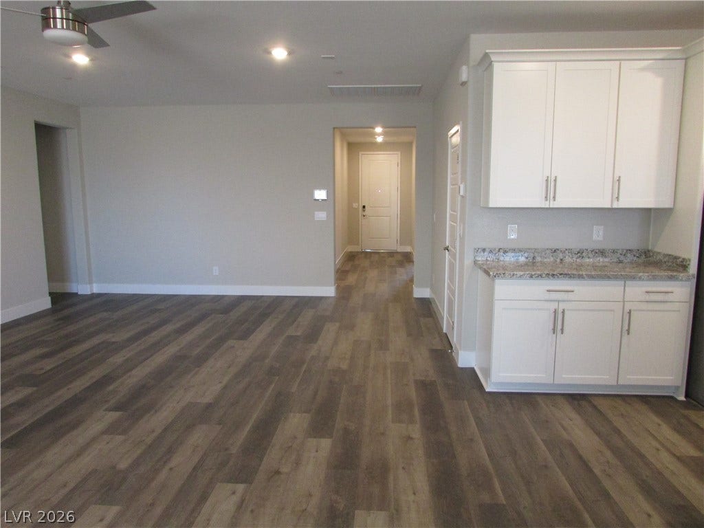 510 CHESTNUT FALCON AVE, Henderson, NV 89011 Clean lines and a functional layout define this well-appointed entry and living space. Photo is actual home.
