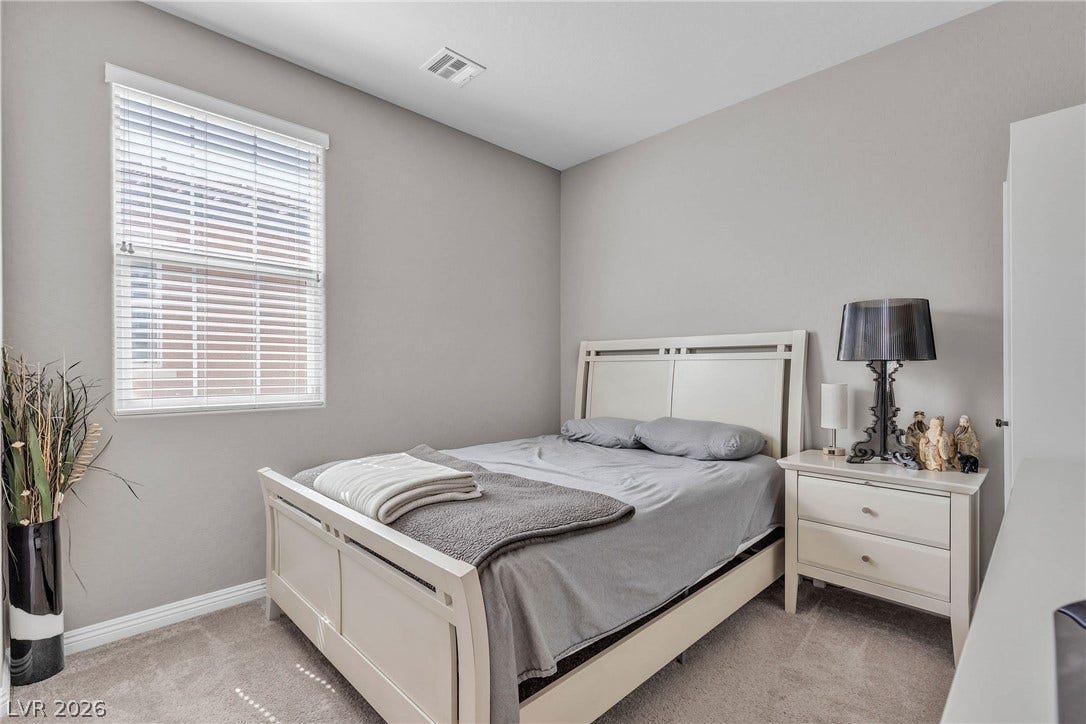 3106 Berceto Court, Henderson, NV 89044 A well-lit room offers quiet comfort, ideal for rest and relaxation.