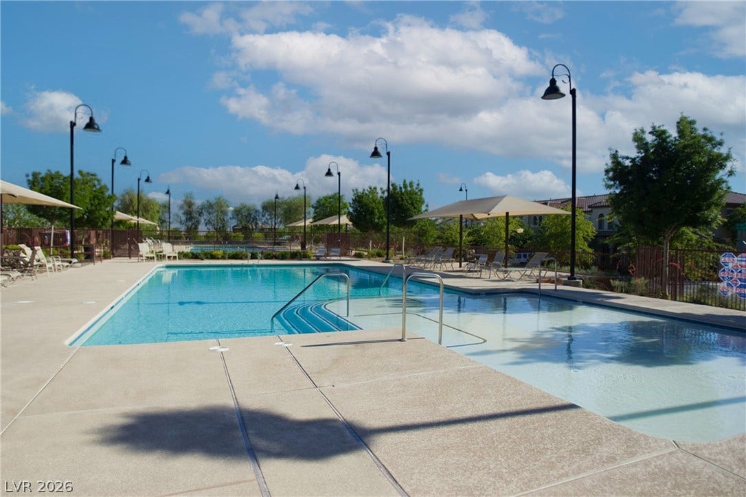 3106 Berceto Court, Henderson, NV 89044 A refreshing outdoor pool awaits, surrounded by lounge areas for ultimate relaxation.