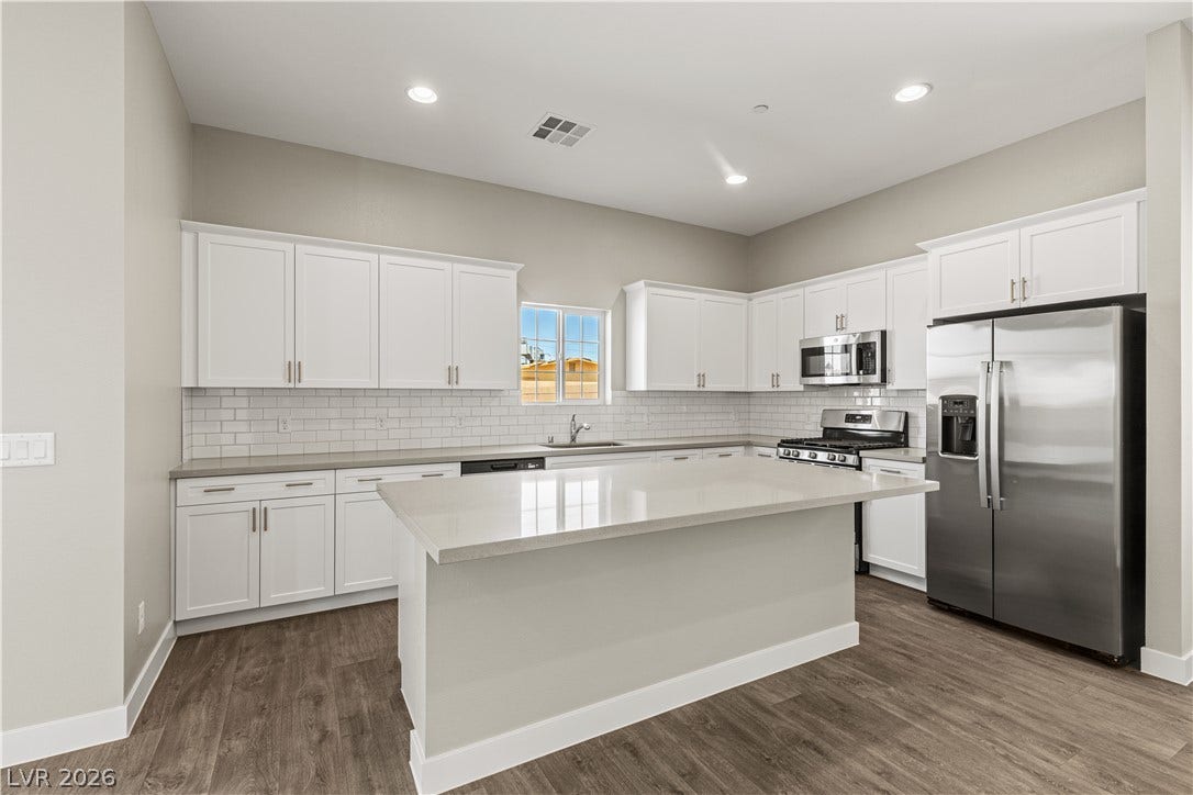 2405 Copperbelt Street, Las Vegas, NV 89030 Modern kitchen with sleek countertops and ample storage space awaits.