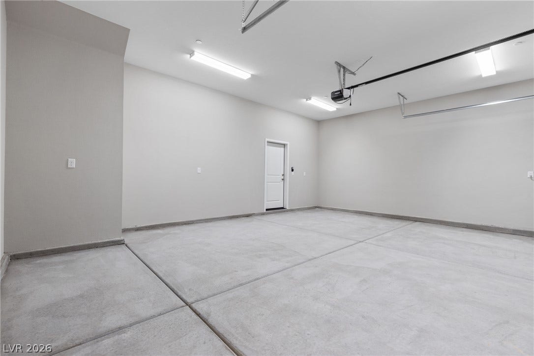 2405 Copperbelt Street, Las Vegas, NV 89030 Ample space for vehicles and storage with direct access to the interior.