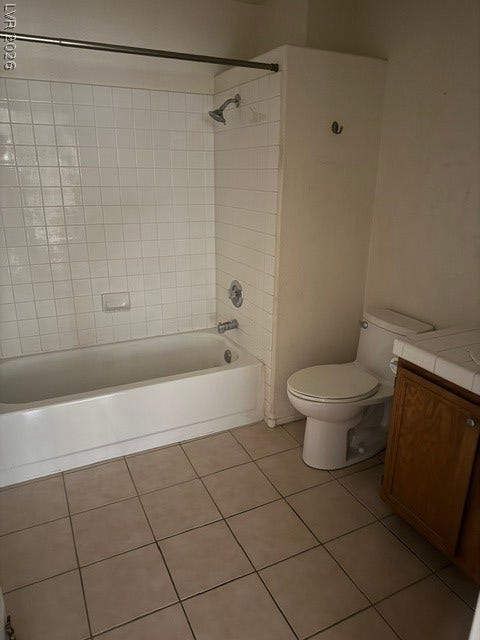 1851 Hillpointe Road, #1412, Henderson, NV 89074 Functional bathroom featuring a shower-tub combination and a tile floor for easy maintenance.