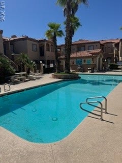 1851 Hillpointe Road, #1412, Henderson, NV 89074 Relax poolside in this refreshing outdoor oasis, surrounded by mature palm trees and stylish architecture.