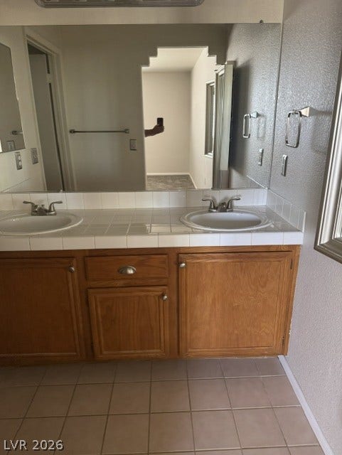 1851 Hillpointe Road, #1412, Henderson, NV 89074 Double vanity with ample storage beneath offers functional elegance.