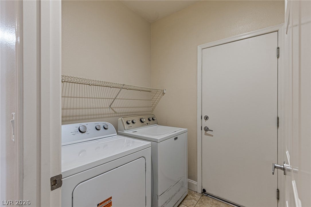 2157 Sawtooth Mountain Drive, Henderson, NV 89044 A dedicated utility space with essential laundry appliances for daily convenience. Washer and Dryer Included.