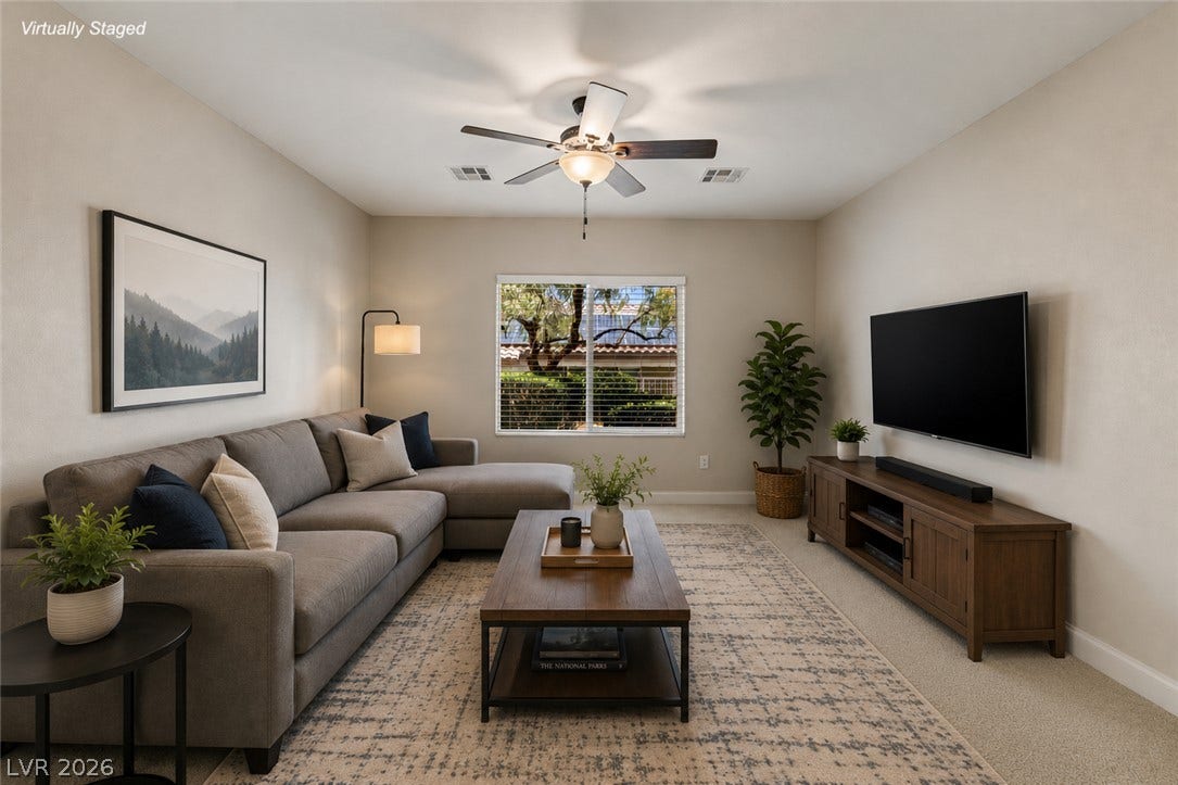 2157 Sawtooth Mountain Drive, Henderson, NV 89044 Den with ceiling fan and natural light can be used as flex space for home office, fitness room, or relaxing.