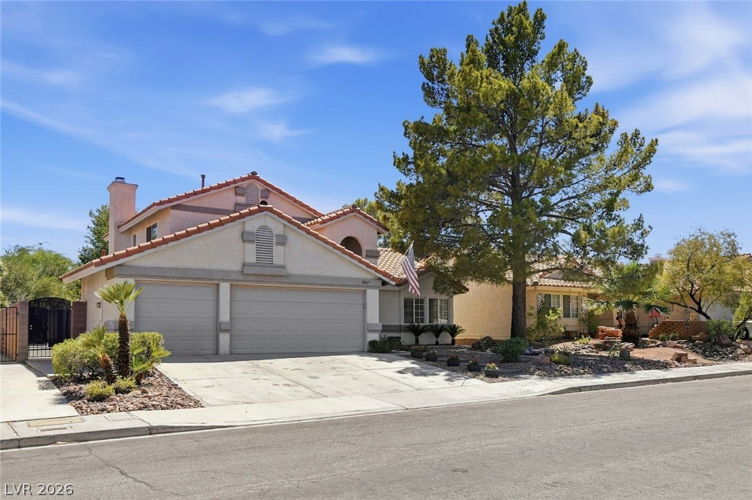 1827 Escondido Terrace, Henderson, NV 89074 A classic stucco home with a tile roof and two-car garage awaits.